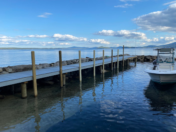 new colored clean dock with boat