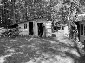 old black and white shack